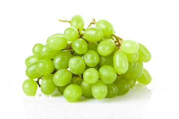 Fresh green grapes on white background