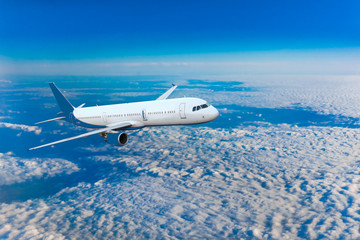 Passenger airliner flight in the blue sky