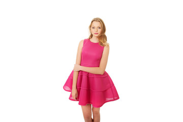Young blonde woman with pink skirt
