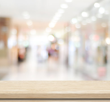 Empty table and blurred store with bokeh background, product dis