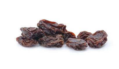 Dried raisins on a white background