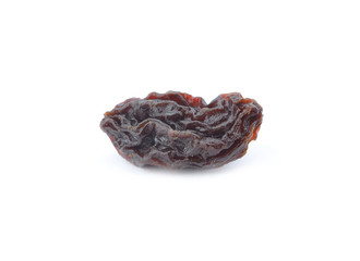 Dried raisins on a white background