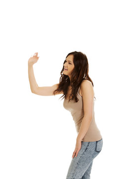 Young woman hits someone.