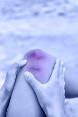 Sport injury - painful knee wound accident
