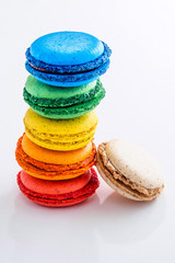 Colorful macaroons on white background
