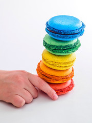Colorful macaroons on white background