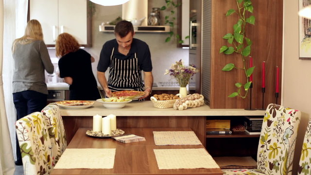 Friends preparing lunch at home