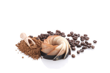 chocolate coffee dessert, kako powder and coffee beans on white