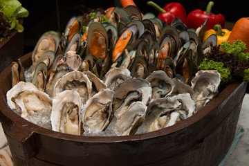 oyster on the wood box in restaurant