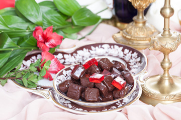 red jelly in chocolate on a plate luxury