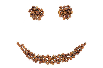 Grains of coffee in the form of smiling face isolated. coffee