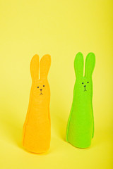 Two easter Bunnies on yellow
