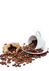 white cup with coffee beans isolated