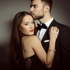Sexy passion couple in love. Portrait of beautiful young man and