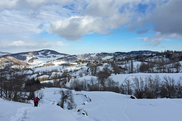 Fototapeta na wymiar Snowshoeing on the alps in winter