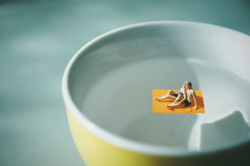 man and woman relax on the coffee cup