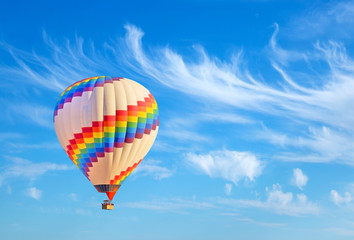 Obraz premium Hot-air balloon and blue sky.