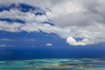 Fototapeta na wymiar Tropical island with blue water and beautiful sky