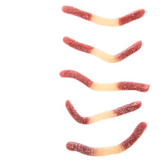 Brown and white sugar jelly candy strip over white background