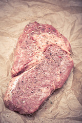 fresh, grilled beef steak on wooden background 