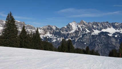 Fototapeta na wymiar Ski slope and view of the Churfirsten