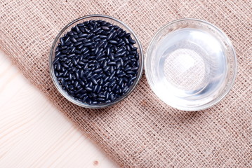 raw black beans on the board diet food