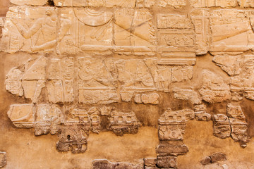 old egypt hieroglyphs carved on the stone