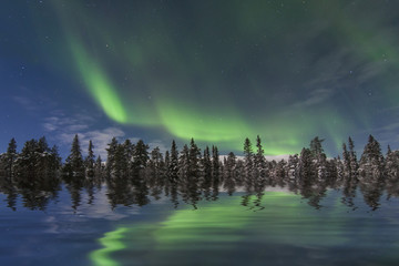 Fototapeta na wymiar Reflection of Aurora Borealis