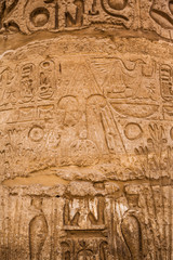 old egypt hieroglyphs carved on the stone
