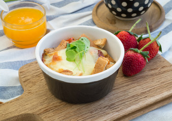 Set of breakfast with toasts , egg, sausage, coffee and fruits