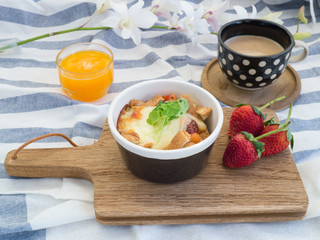 breakfast with toasts, egg, coffee and fruits
