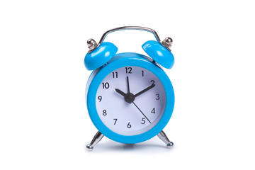 Alarm clock on white background
