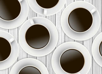 White cups of coffee on wooden background