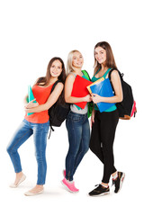 Three smiling college students on a white background