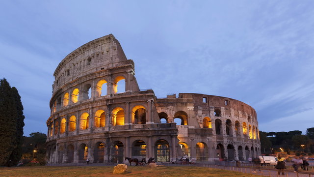 4K Time lapse zoom out Colosseum Rome sunset, Italy