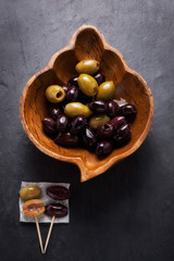 Top shot of appetizer starter olives in a bowl