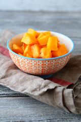 Pumpkin stewed in a bowl on napkin