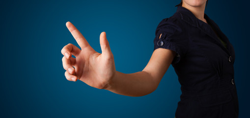 Woman pressing imaginary button