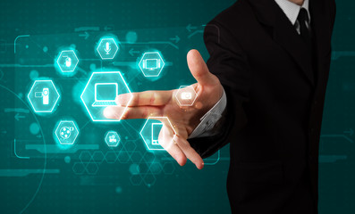 Businessman pressing virtual media type of buttons