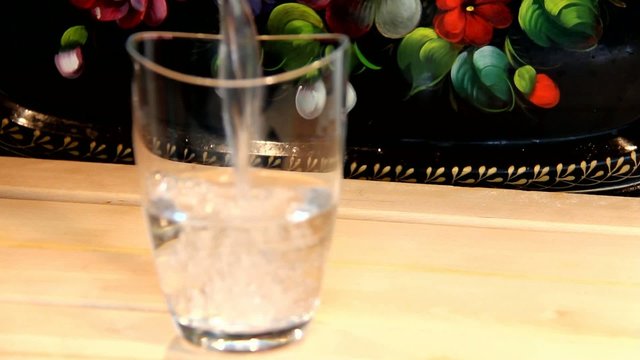 Glass of water on the wooden table