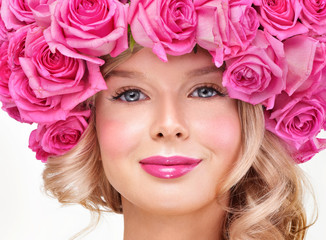 Fashion Beauty Model Girl with Pink Roses. Bouquet of Beautiful