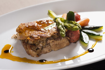 Meat with sauce and vegetables