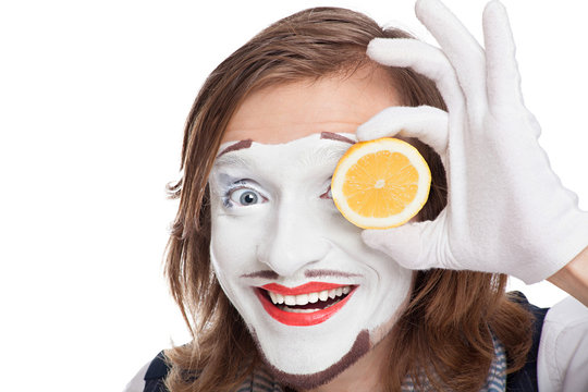 Mime Actor Attaching To Face Lemon