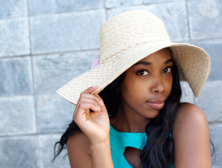 Beautiful african american woman with sun hat