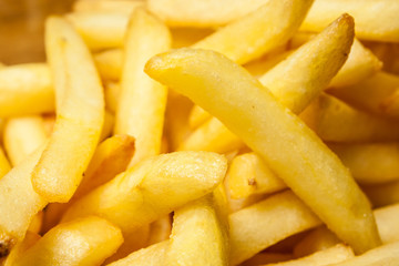 Tasty golden french fries on a plate - 78592083