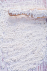 Obraz premium copyspace photo handle of wooden rolling pin with flour food and