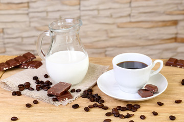 Black coffee with chocolate and cream