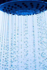 Obraz na płótnie Canvas Shower Head with Running Water