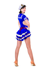 young dancer woman dressed as a sailor posing on an isolated