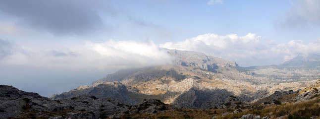 Ssummer landscape panorama with mountains and clouds
